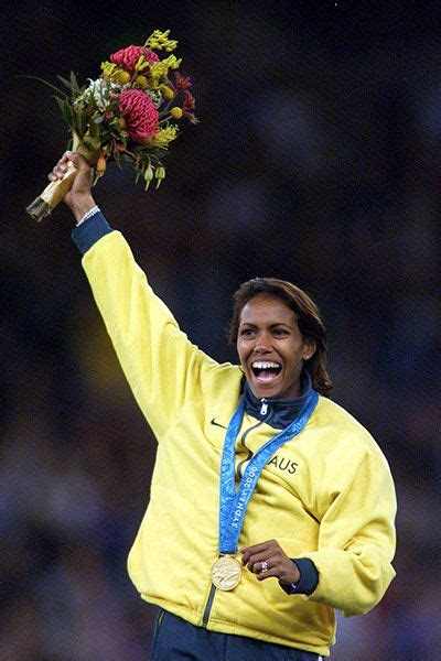 50 Stunning Olympic Moments Cathy Freeman S Gold In Pictures Olympics In This Moment