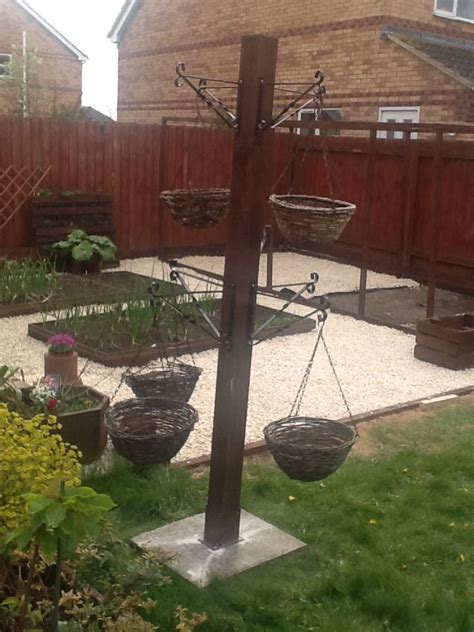 Many hanging baskets now also come with a reservoir compartment, which allows them to store more water. Hanging basket tree made this morning. This should house a ...