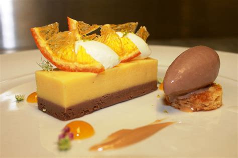 Triple chocolate mousse cake recipe. Bitter Orange Cremeux, Milk Chocolate Hazelnut Cream, cara ...