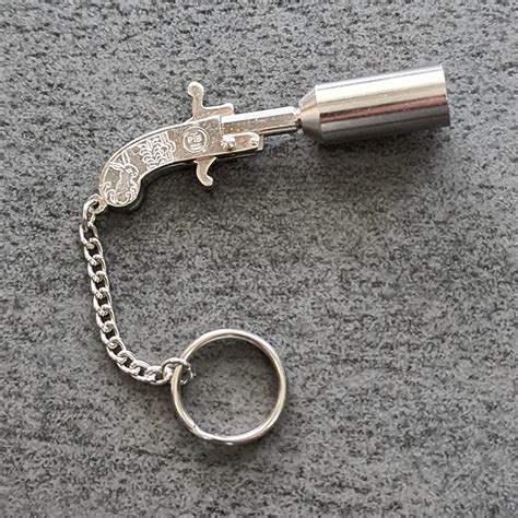 Berloque Mini Pistole 2 Mm Schreckschuss In Holzkassette Luftgewehr