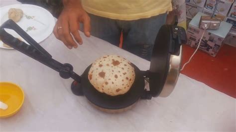 A type of flat, round south asian bread 2. Roti maker demo in English. - YouTube
