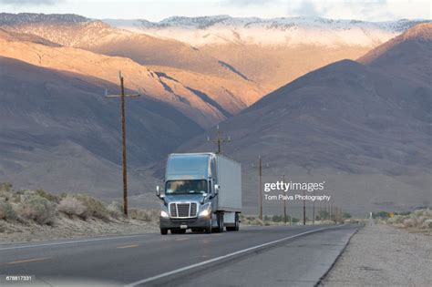 Semitruck Driving On Mountain Road High Res Stock Photo Getty Images