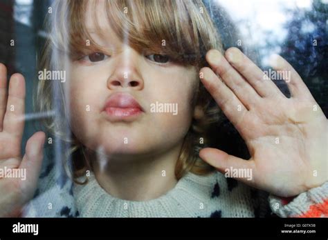 Pressing Hands Against Glass Hi Res Stock Photography And Images Alamy