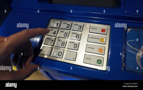 Blue Color Banking Atm Machine And Black Number On White Button Keypad