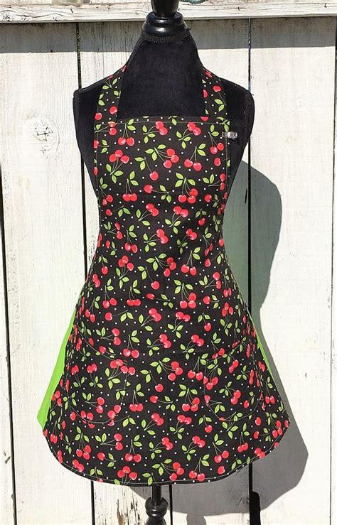 women s cherry and polka dot print apron with green side etsy printed aprons women polka dot