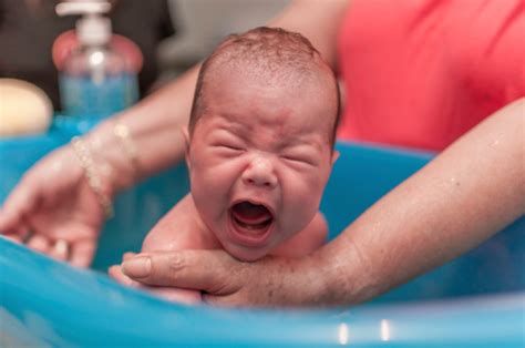 Start by giving your child a sponge bath in the sink for a few weeks. My baby hates the bath - how can I help him like it?
