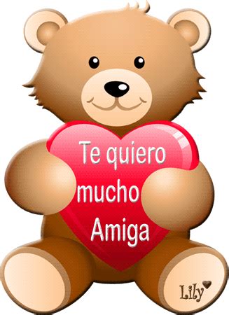 A Teddy Bear Holding A Heart With The Words Te Quiero Mucho Amiga