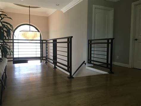 Selecting the right stair railing or hand rail for your space is a major design decision that can impact the feel of your home. Fusion Metalworks - Wrought Iron - Interior Stair Railings