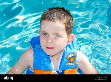 Young Boys Playing In The Swimming Pool Stock Photo Alamy