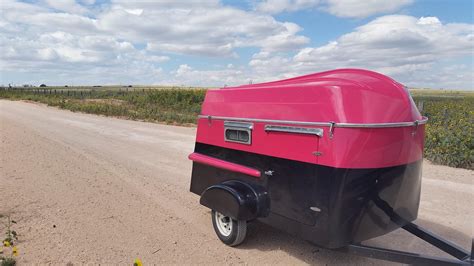 American Dream Trailer Revives Vintage Camper With Rowboat Roof