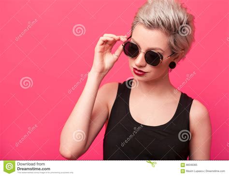 Summer Portrait Of An Attractive Young Woman In Sunglasses Stock Image