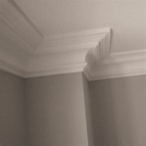 Hold the coving in place and line up the edges with the pencil guide lines on the wall and ceiling. Coving | Plaster Cornice | Plaster Mouldings