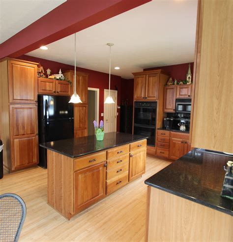 Instead of using tile, a sheet backsplash features a large, continuous solid slab of quartz for a sleek, modern look. Black Quartz Countertop with Black Subway Tile Backsplash ...