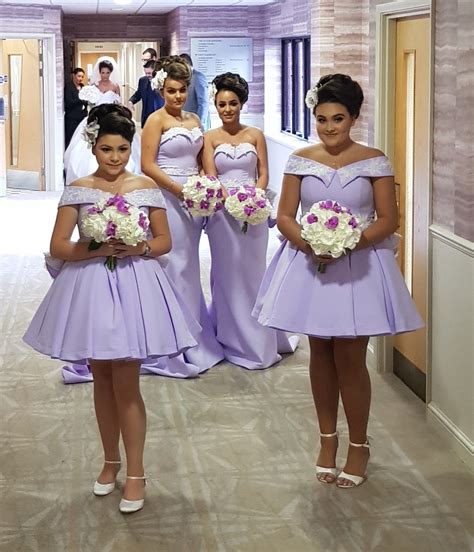 The Bridesmaids Are All Dressed In Lavender Dresses