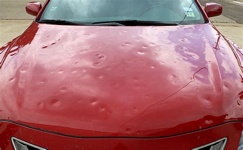 Once you feel the panel is hot enough and the metal has expanded you would apply dry ice to the dent. Repairing Hail Damage to your Car | Car Tips