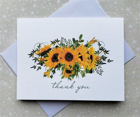 A Thank You Card With Sunflowers And Greenery