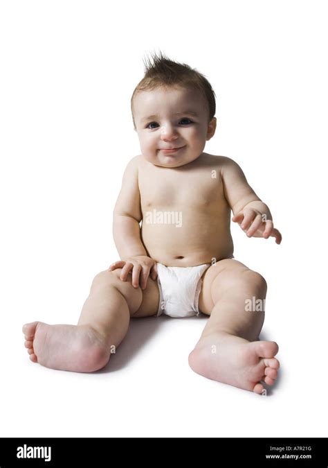 Baby Sitting In Diaper Stock Photo Alamy