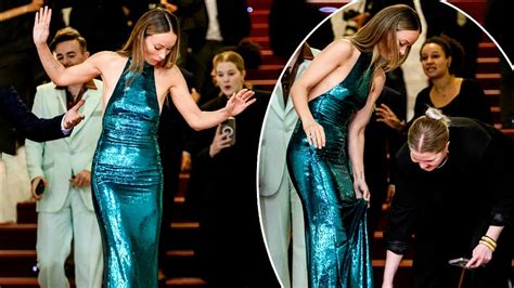 Olivia Wilde Suffers Wardrobe Malfunction And Almost Falls As Heel Gets Caught In Gown Youtube