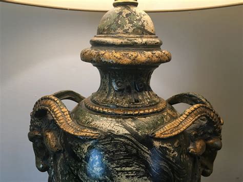 These items are essential for a localized source of light that is easy on the eyes yet allows one to focus. 1950s Hand Painted Plaster Rams Head Urn Form Table Lamp ...