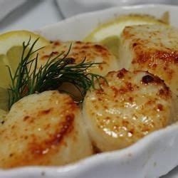 A delicous scalloped potato gratin recipe made with thinly sliced yukon gold potatoes layered in a small saucepan, bring milk, thyme, bay leaf and nutmeg to a boil; Broiled Scallops | Recipe | Scallop recipes, Broiled scallops recipe, Food recipes
