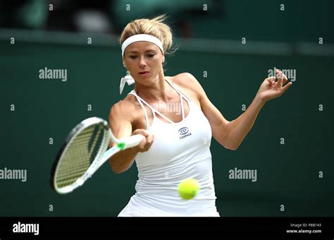 Camila Giorgi In Action On Day Eight Of The Wimbledon Championships At