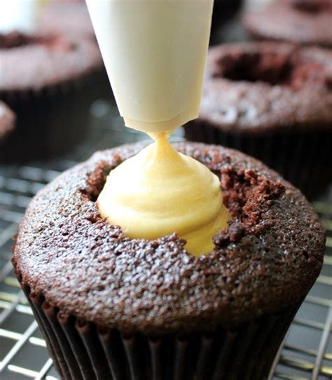 1 hour 10 mins 2 reviews jump to recipe. peanut butter cream cheese filled cupcakes This filling ...