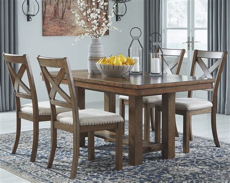 Most dining room sets offer matching or complementing items like china cabinet, credenza, bar, sideboard and buffet. Ashley Moriville Dining Room - Furniture World Galleries