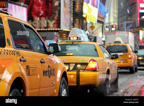 Nyc New York City Rear View Of Yellow Cabs Taxi Queuing On Broadway