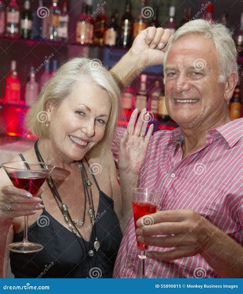 Senior Couple Enjoying Drink In Bar Stock Image Image Of Drink Vertical 55890815
