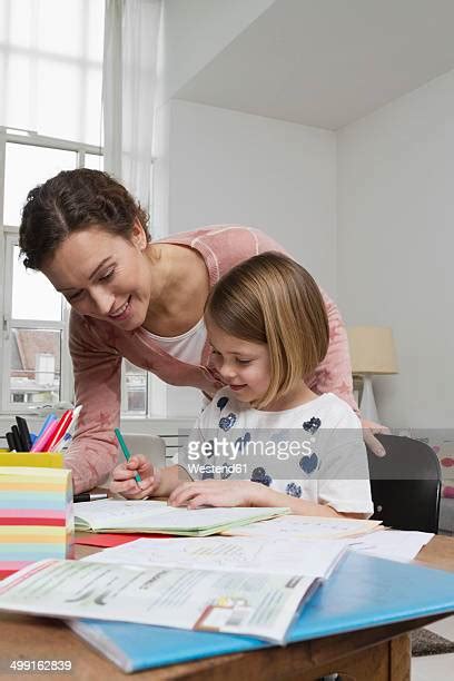 Mom Bending Over Photos And Premium High Res Pictures Getty Images