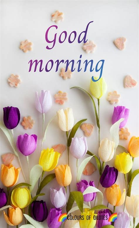 Colorful Flowers With The Words Good Morning Written On It In Front Of