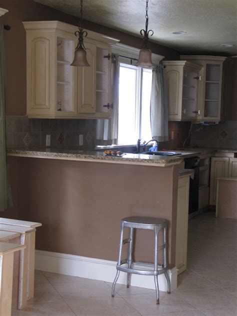 How to paint kitchen cabinets in 5 steps. Painted Kitchen Cabinets - The Wicker House