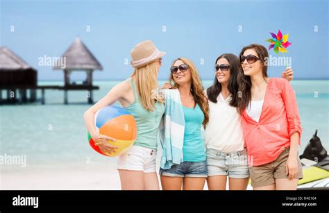 Smiling Girls In Shades Having Fun On The Beach Stock Photo Alamy