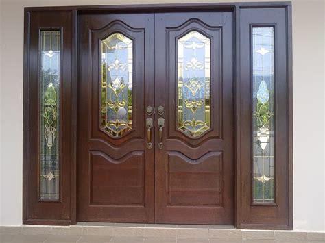 Pintu yang senada dengan dinding rumah. 23 Desain Pintu Rumah Minimalis Dua Daun Motif Masa Kini!