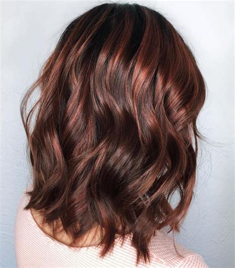 When you mix classic brunette shades with ribbons of sandy blonde, coppery brown, or hints of red, you have yourself a mane masterpiece that simply can't be beat. Red Highlights Ideas for Blonde, Brown and Black Hair