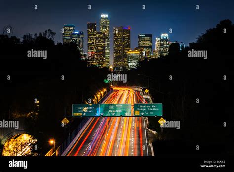 View Of The 110 Freeway And Downtown Los Angeles Skyline At Night From