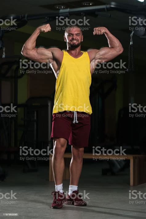 Bodybuilder Flexing Muscles Stock Photo Download Image Now Men