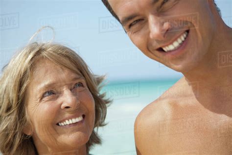 Mother And Adult Son At The Beach Portrait Stock Photo Dissolve