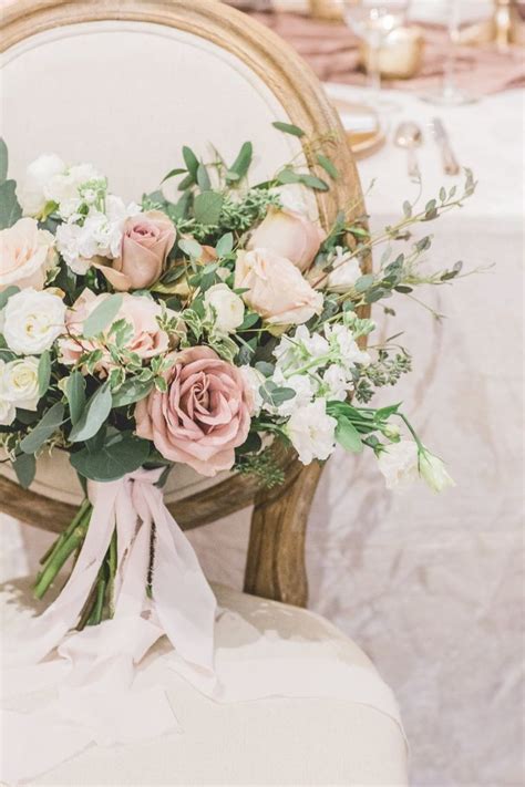 Maybe you would like to learn more about one of these? Loose and airy wedding bouquet with blush and dusty mauve ...