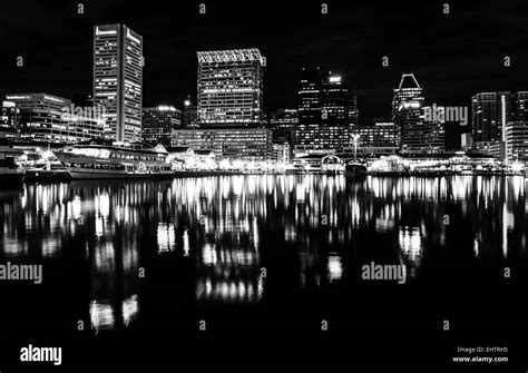 Long Exposure Of The Skyline At Night From The Inner Harbor In