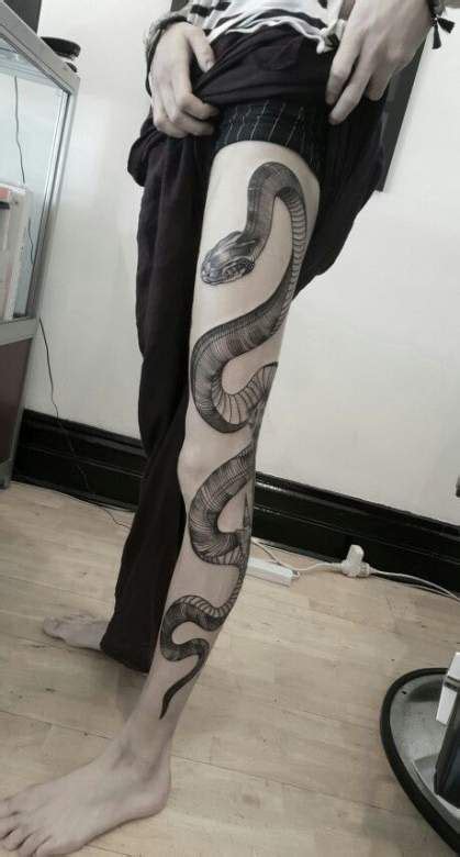 Snake tattoos can either fascinate or cause negative feelings. Scary Snake Tattoose On The Leg - 150 Meaningful Snake Tattoos (Ultimate Guide, August 2019 ...