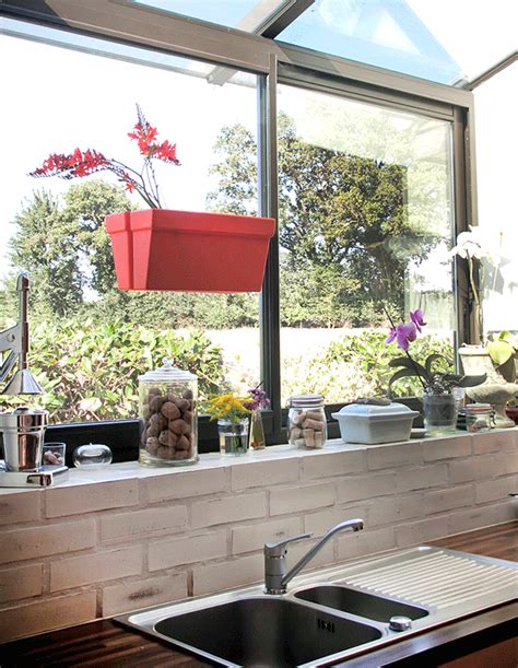 An indoor window box can act as a herb garden that eliminates any countertop clutter that other kitchen gardens can create. Magnetic Indoor-Outdoor Planter Adheres to Both Sides of ...