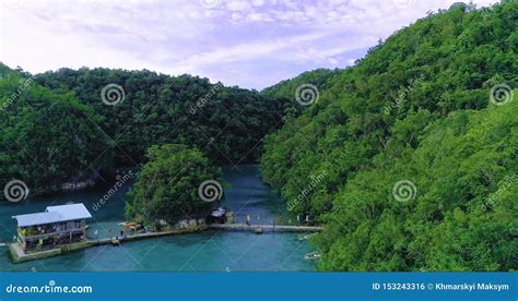 Tropical Landscape Rainforest Hills And Azure Water In Sugba Lagoon