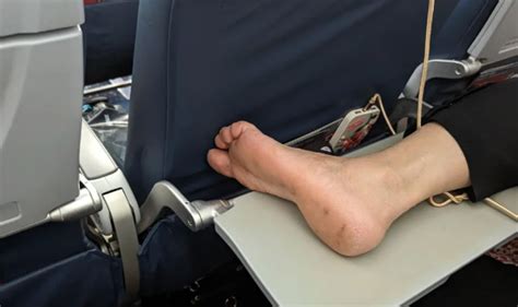 Plane Passenger S Disgust As Stranger Next To Him Rests Bare Foot On Tray Table Uk News