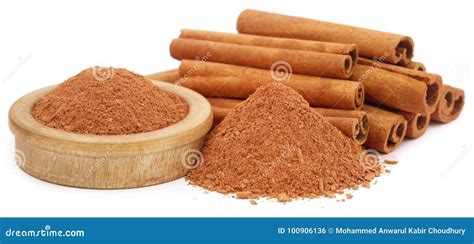 Bunch Of Some Fresh Aromatic Cinnamon With Powder Spice Stock Photo