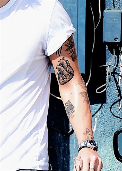 Harry Styles Tattoos Broken Heart Harry Styles 52 Tattoos And Their