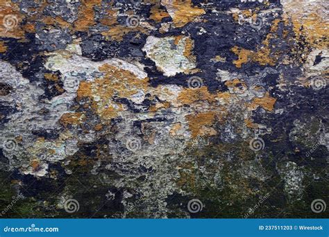 Closeup Of An Old Weathered Stone Wall With Rust Textures Stock Image