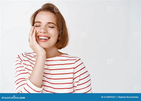Portrait Of Beautiful Happy Woman Touching Skin And Smiling Tenderly