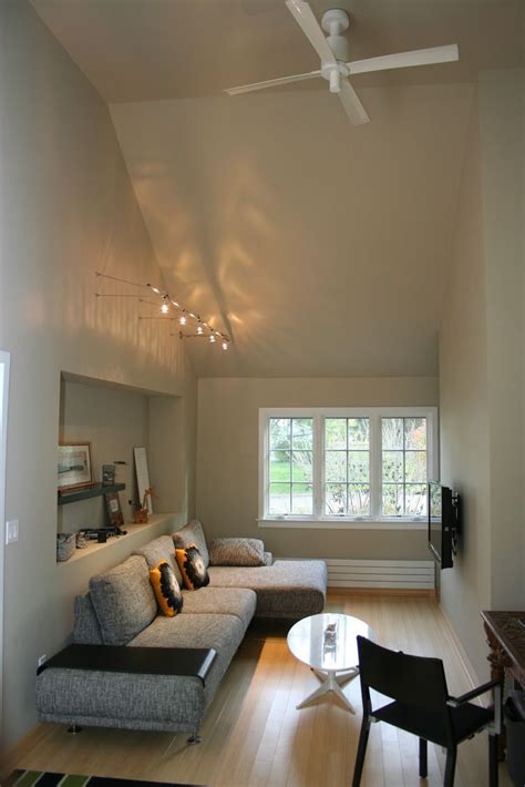 Vaulted ceilings were used only in cathedrals or basilicas. Lighting vaulted ceiling living room | Vaulted ceiling ...