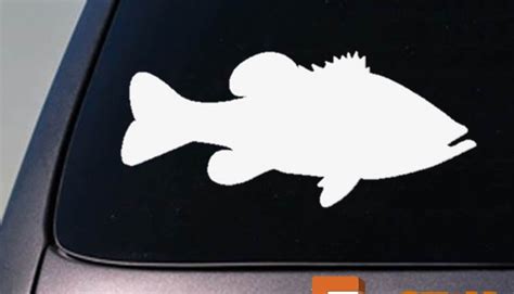A Fish Sticker On The Side Of A Car